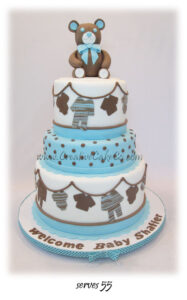 Blue, Beige, & White Baby Clothesline Cake